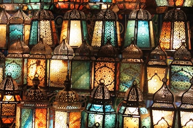 Rows of colourful glass lanterns lit up at a market in Cairo